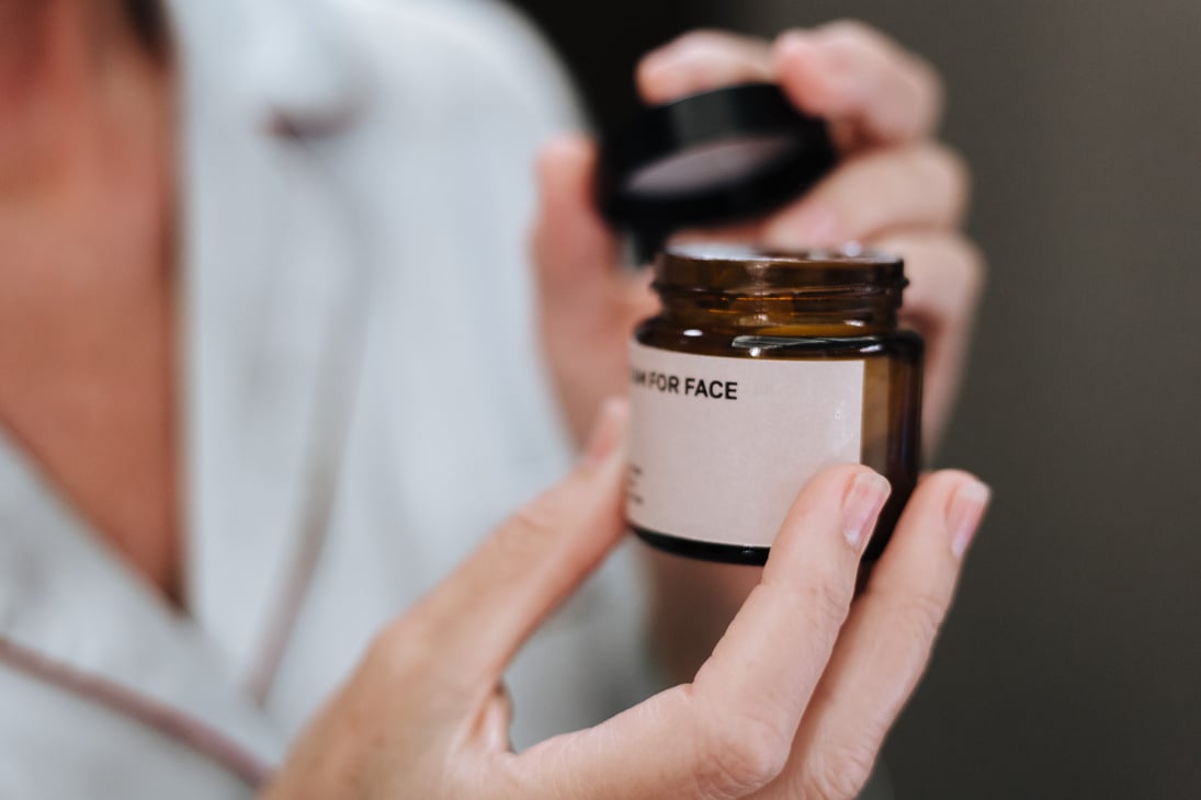 Woman holding Face Cream